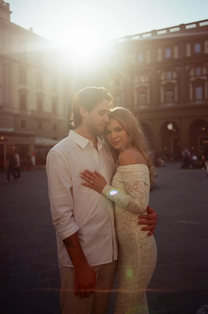 couple is hugging each other with back light