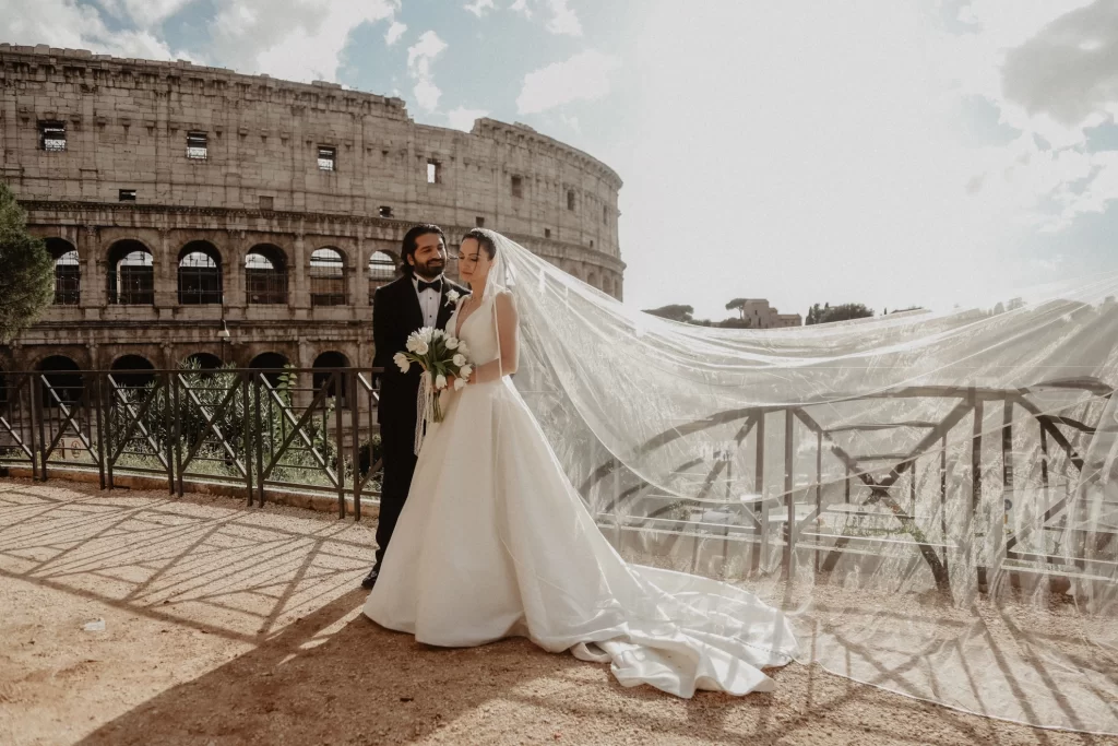 wedding couple in front of Colosseum