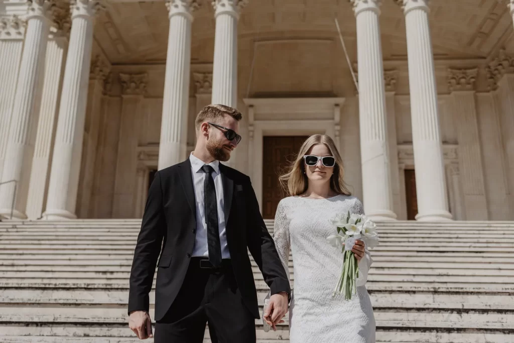 a couple is climbing down the stairs