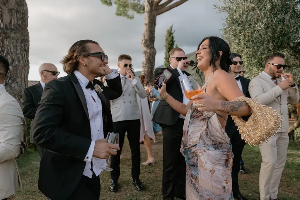 wedding party, two guests are dancing