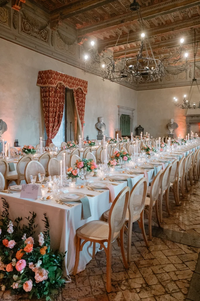 Set up tables and decorations inside Castello Orsini Odescalchi di Bracciano