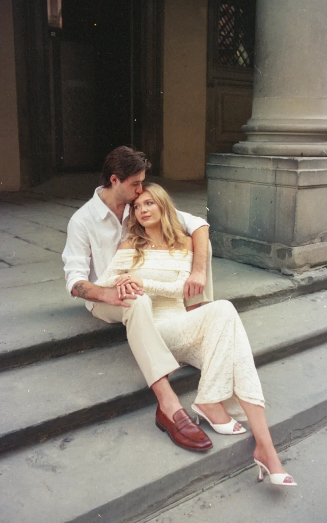 couple is sitting on steps