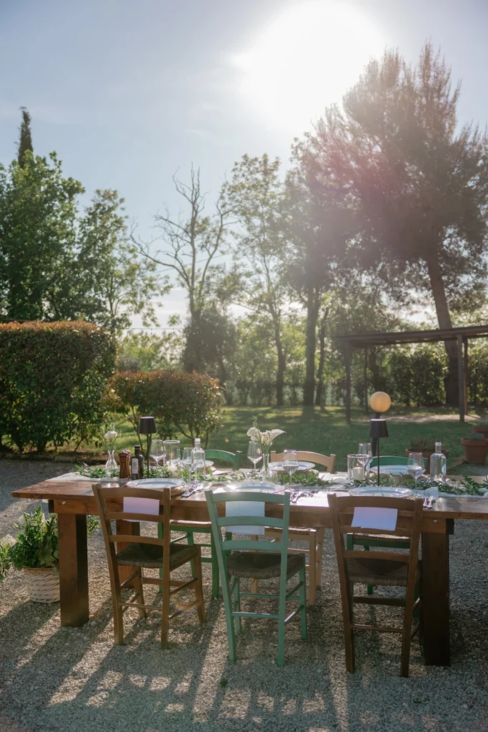 Long Table with Colorful Chairs at Podere San Giorgio, Palaia Tuscany